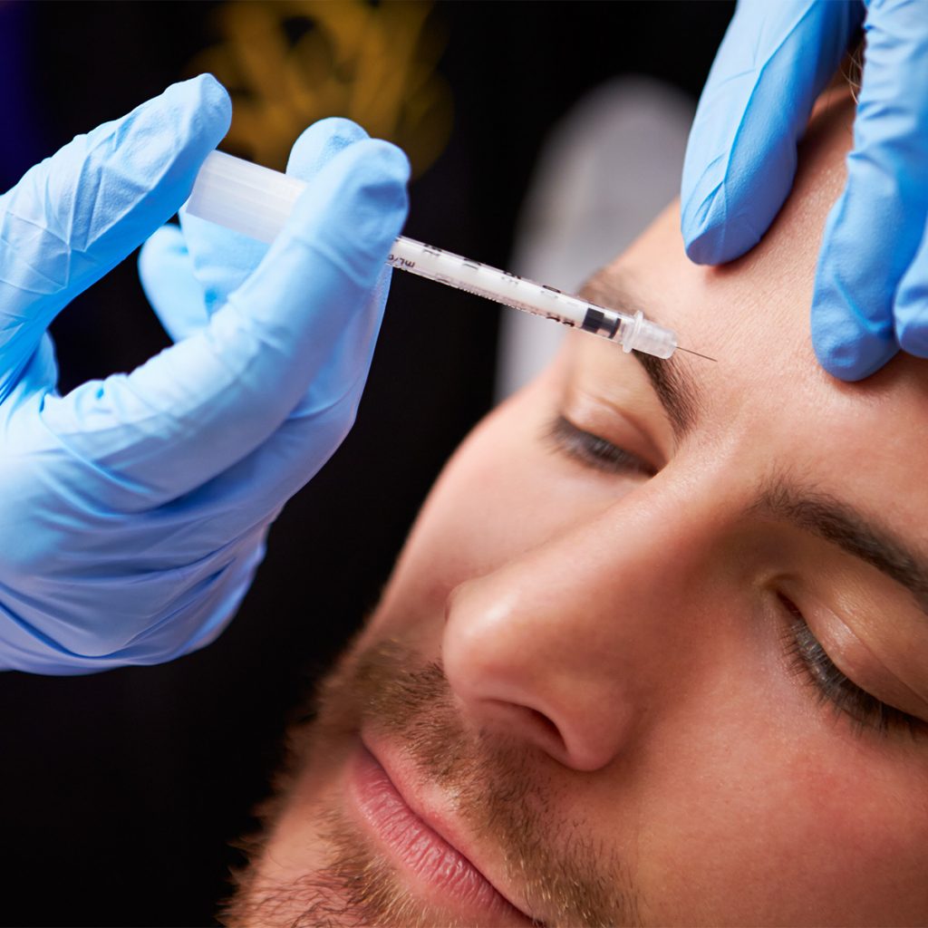 Man receiving a Botox injection